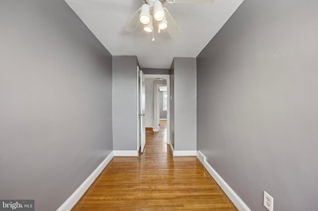 hallway with light wood-type flooring