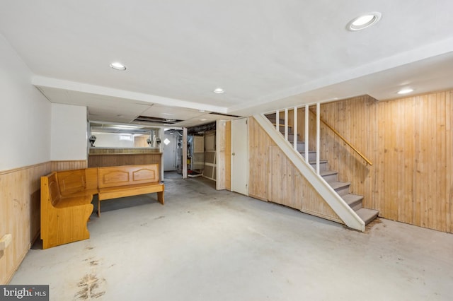 basement with wooden walls