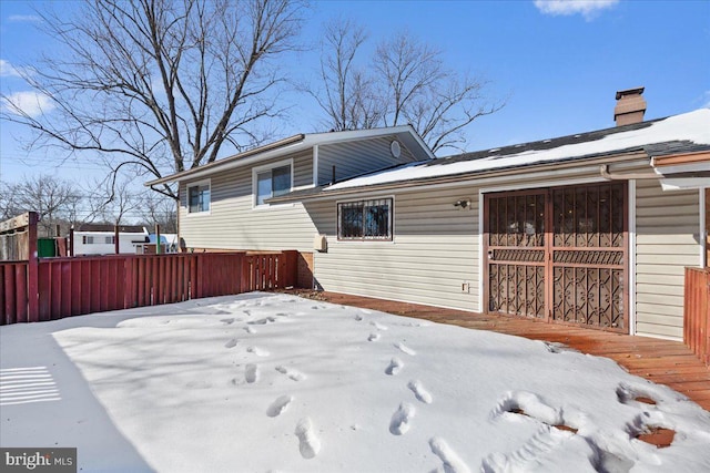 view of snow covered property