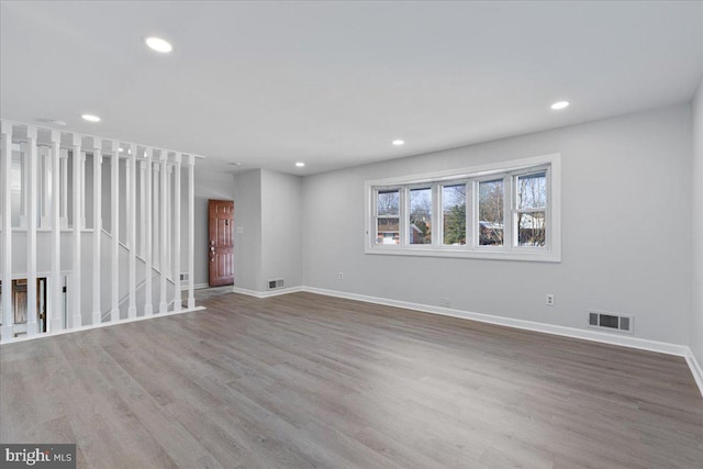 spare room featuring light wood-type flooring