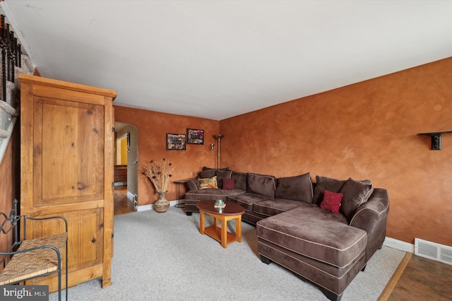 living room featuring carpet