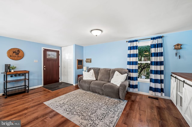 living room with dark wood-type flooring