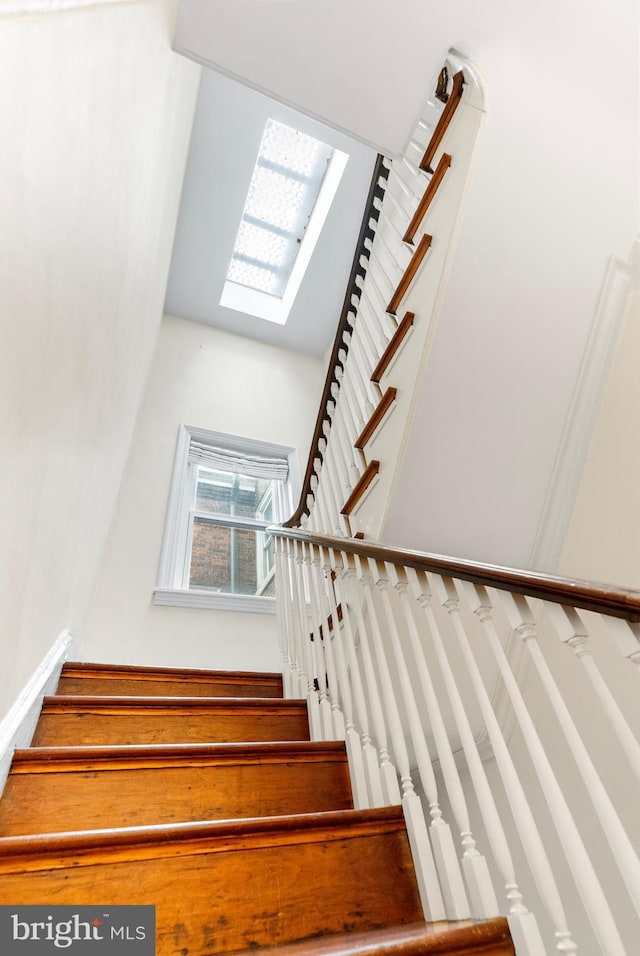 stairway with a skylight