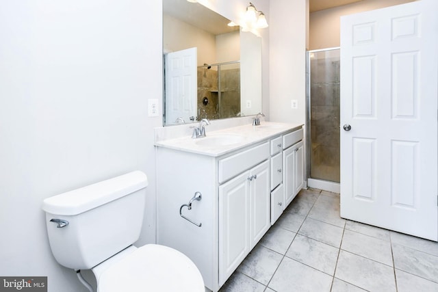 bathroom featuring vanity, toilet, and walk in shower