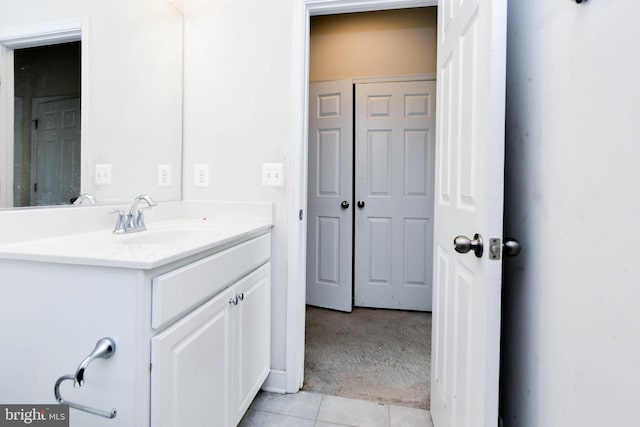 bathroom with vanity and tile patterned flooring