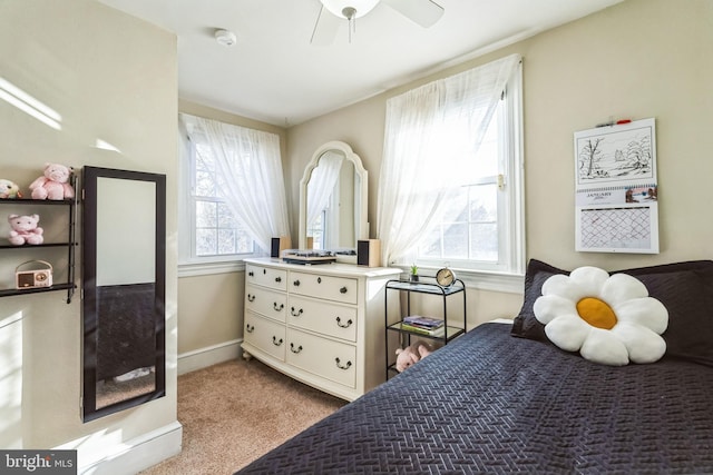 bedroom with light carpet