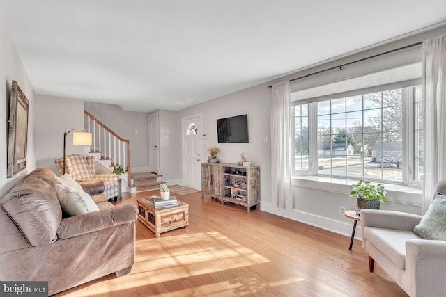 living room featuring light wood-type flooring