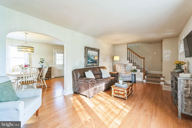 living room with light hardwood / wood-style flooring