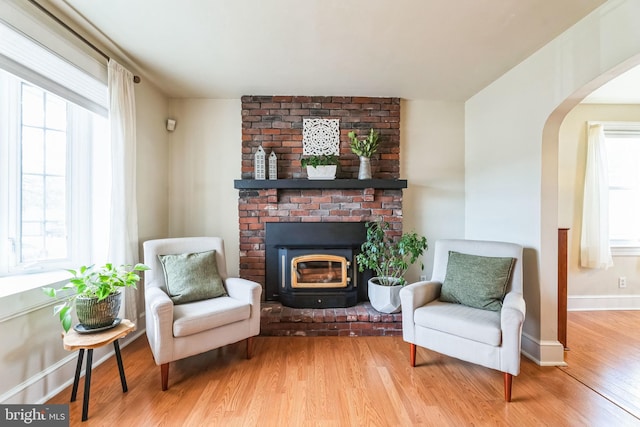 sitting room featuring plenty of natural light and light wood-type flooring