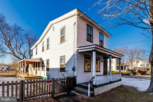 view of home's exterior with covered porch