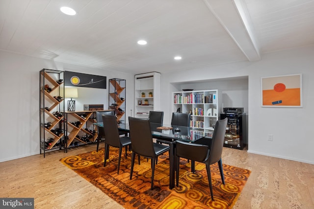 dining room with beamed ceiling