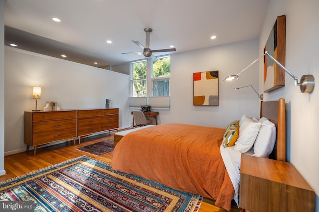 bedroom with wood-type flooring