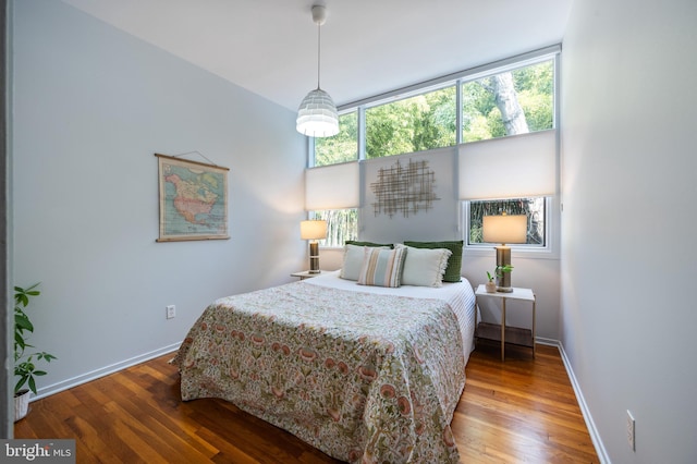 bedroom featuring hardwood / wood-style floors