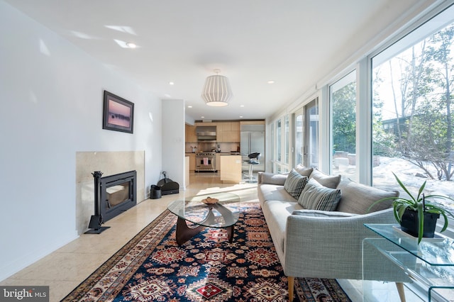 tiled living room with a fireplace