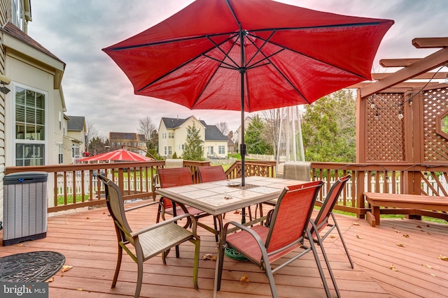 wooden deck with central air condition unit