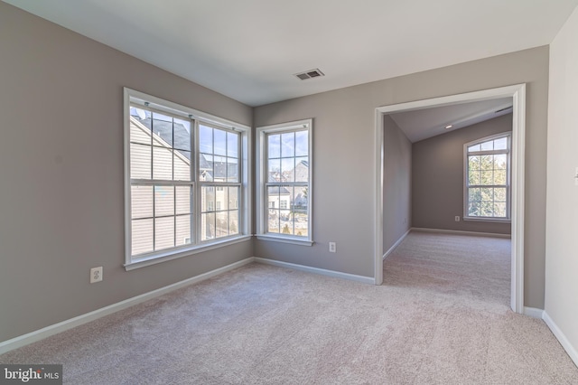 view of carpeted spare room