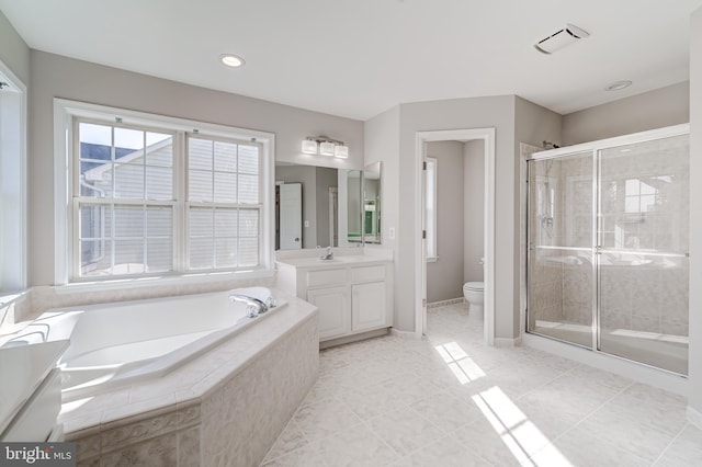 full bathroom featuring vanity, tile patterned flooring, plus walk in shower, and toilet