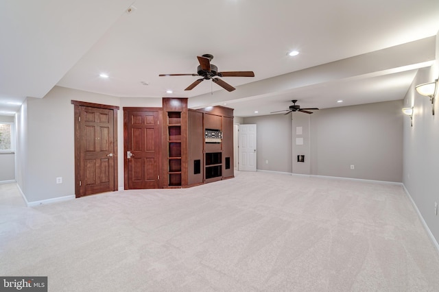 unfurnished living room with light carpet