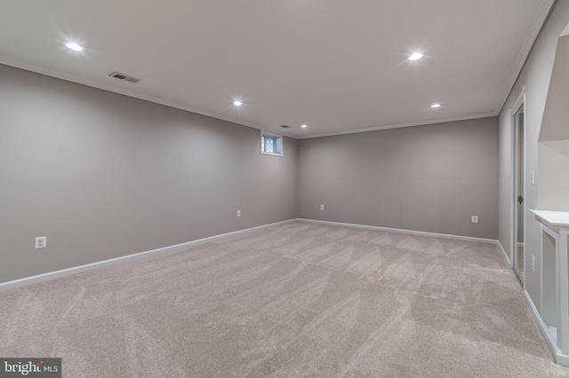 interior space with light carpet and ornamental molding