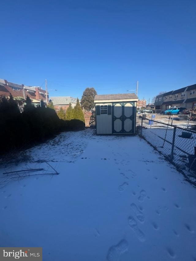 view of yard covered in snow