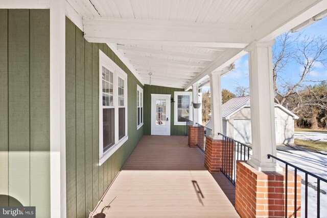 wooden deck with a porch