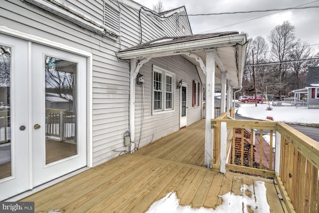 view of snow covered deck