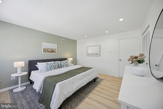 bedroom featuring wood-type flooring