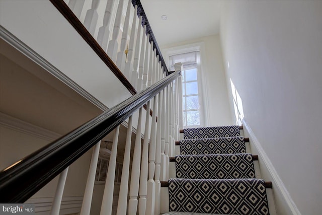 stairway with baseboards