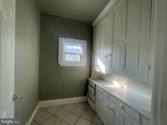 bathroom featuring vanity and tile patterned flooring