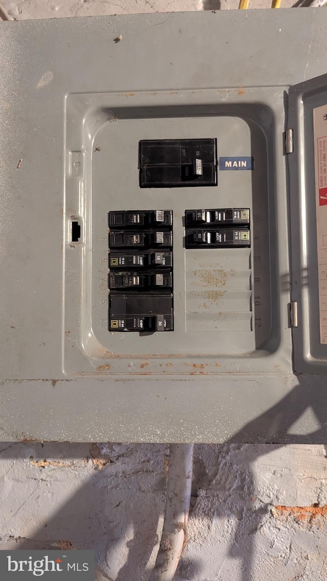 utility room featuring electric panel