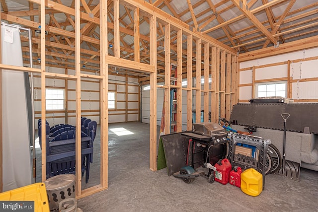 misc room featuring vaulted ceiling and a wealth of natural light