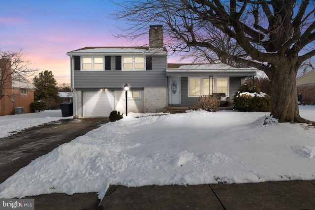 view of front of home with a garage