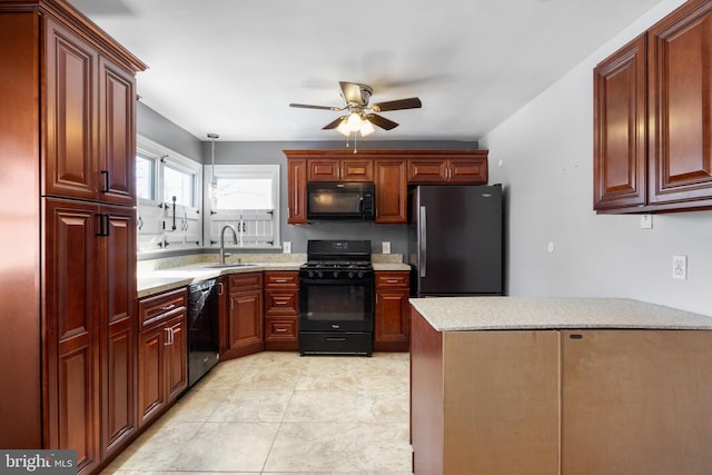 kitchen featuring sink, light stone counters, light tile patterned floors, ceiling fan, and black appliances