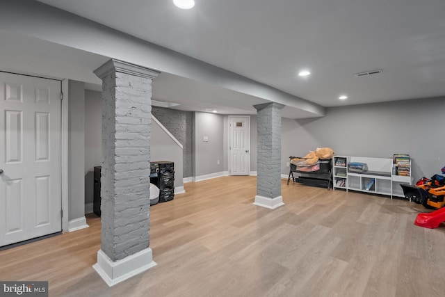 basement featuring light wood-type flooring