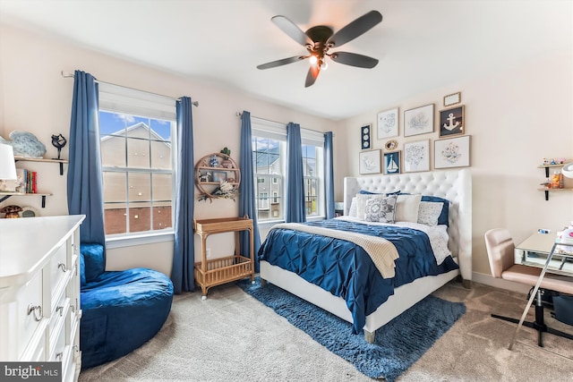 carpeted bedroom featuring ceiling fan