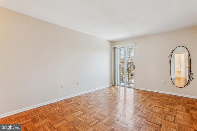 spare room with light parquet floors