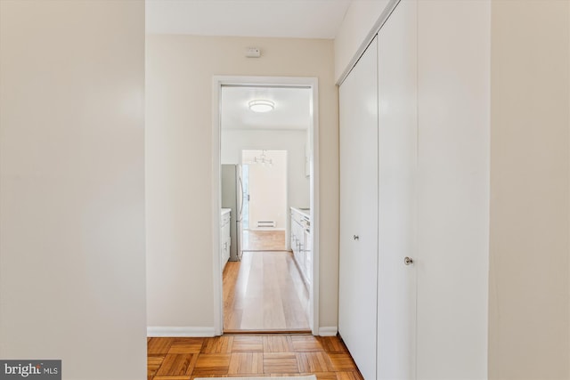 hall with light parquet floors