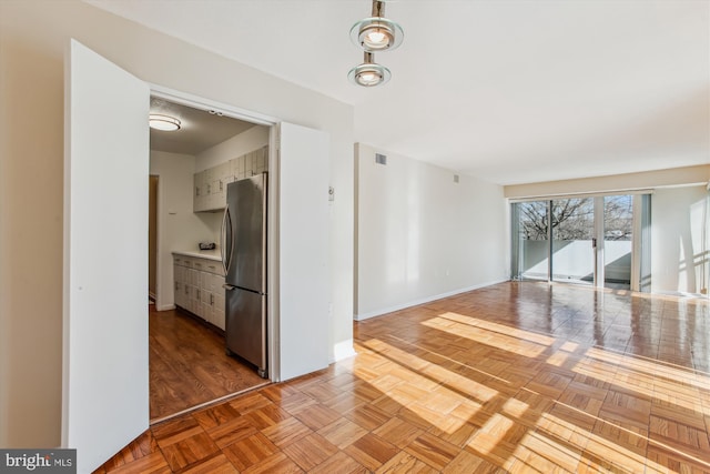 empty room featuring parquet floors