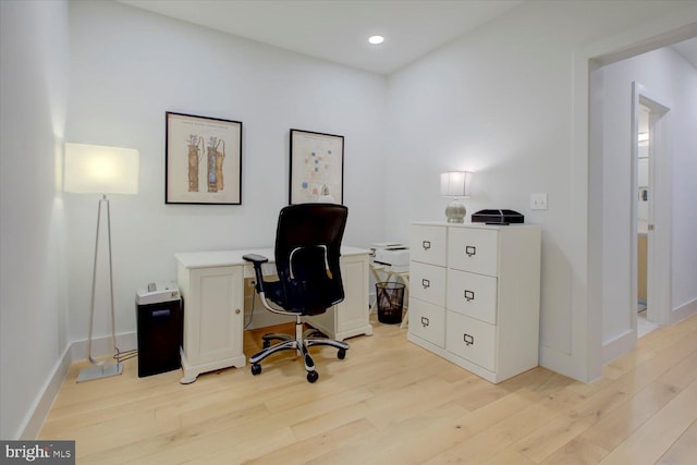 office with light wood-style flooring, baseboards, and recessed lighting