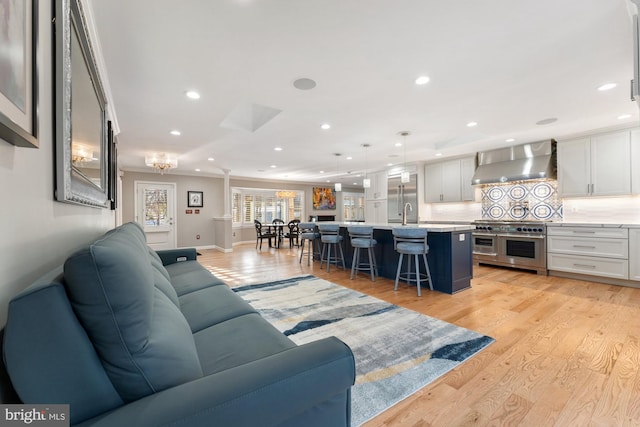 living room featuring light wood-type flooring