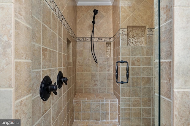 bathroom featuring a tile shower