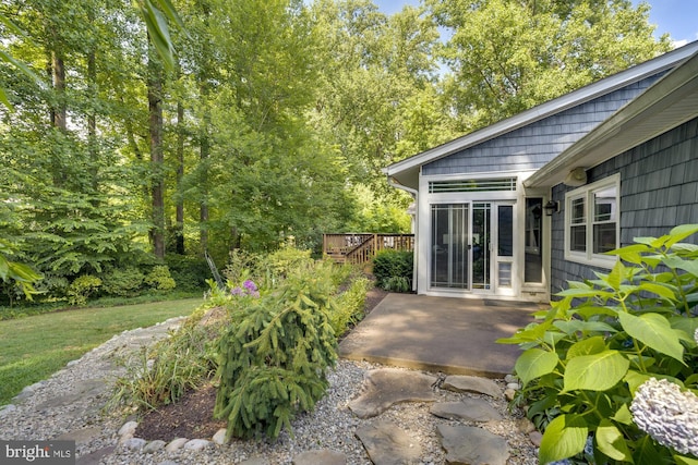 view of yard with a deck