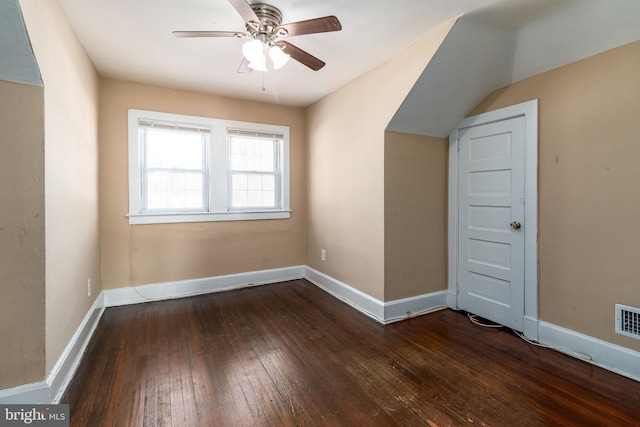 bonus room featuring dark wood-type flooring and ceiling fan