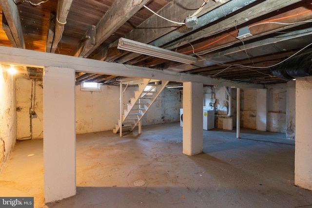 basement with washer / dryer