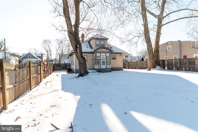 view of snow covered property