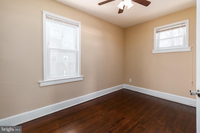 unfurnished room with hardwood / wood-style floors and ceiling fan