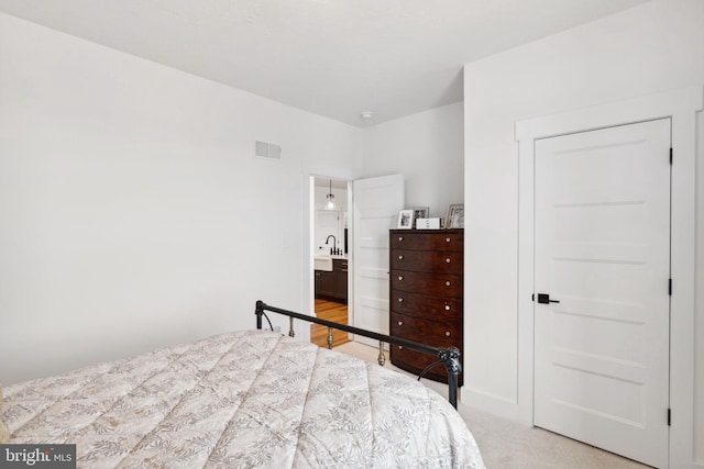 bedroom featuring carpet