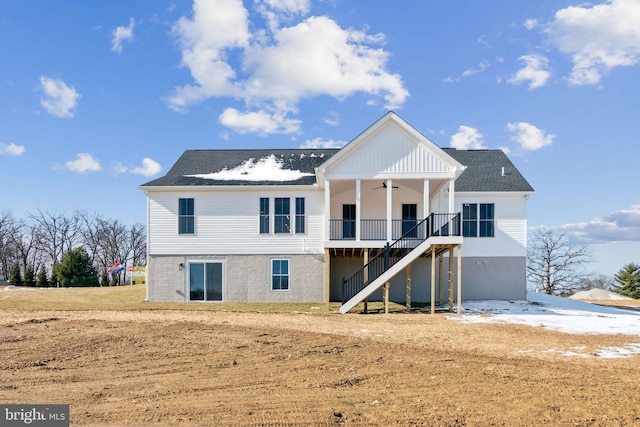 back of house with ceiling fan