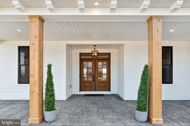 property entrance featuring french doors