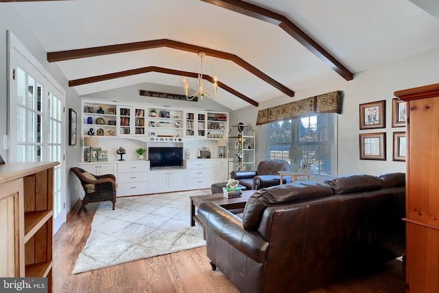 living room with a chandelier, lofted ceiling with beams, built in features, and light wood-type flooring